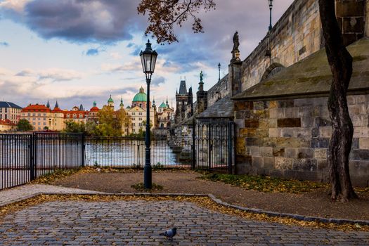 Famous Landmark, Lantern and Charles Bridge, Prague, Czech Republic. Antique lantern in the center of Prague, Charles Bridge. Cityscape of the historic center, Prague. Charles Bridge at sunset.