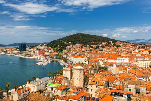Split waterfront and Marjan hill aerial view, Dalmatia, Croatia. Panoramic summer cityscape of old medieval city Split, Croatia, Europe.  Traveling concept background. 