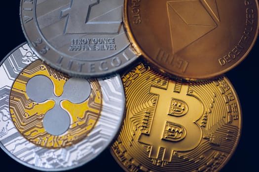 Crypto currency coin set collection, bitcoin, ethereum, litecoin, ripple. Digital currency. Cryptocurrency. Silver and golden coins with bitcoin, ripple, litecoin and ethereum symbol.