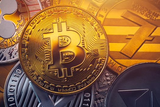 Set of cryptocurrencies with Bitcoin, Etherium, Ripple, Litecoin. Cryptocurrencys new digital money. Bitcoin on the front as the leader. Bitcoin as most important cryptocurrency.