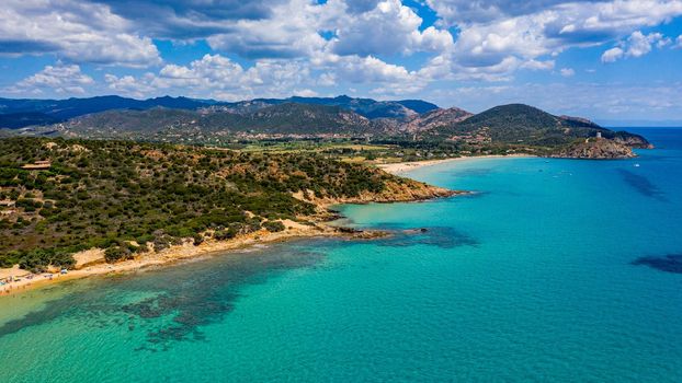 Panorama of the wonderful beaches of Chia, Sardinia, Italy. View of beautiful Chia bay and wonderful beaches, Sardinia island, Italy. Beautiful sea and bay on Su Guideu beach, Sardinia island, Italy