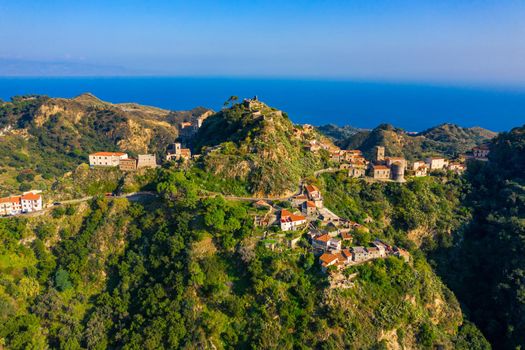 Aerial view of Savoca village in Sicily, Italy. Sicilian village Savoca (known from the Godfather movies). Houses on a hill in Savoca, small town on Sicily in Italy.