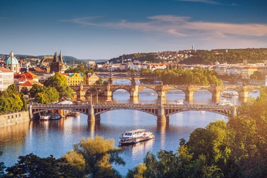 Prague Scenic spring sunset aerial view of the Old Town pier architecture and Charles Bridge over Vltava river in Prague, Czech Republic
