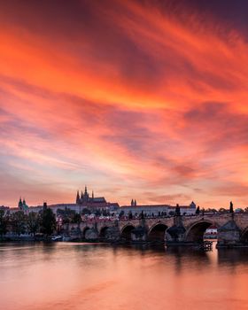 Charles Bridge at sunset with colorful sky, Prague, Czech Republic. Prague old town and iconic Charles bridge and Castle, Czech Republic. Charles Bridge (Karluv Most), Old Town Tower and Castle.