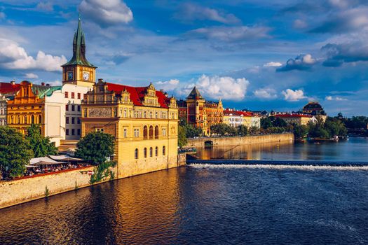 Prague in a sunny day, view of the old town, Prague, Czech Republic. Scenic summer view of the Old Town pier architecture and Charles Bridge over Vltava river in Prague, Czech Republic