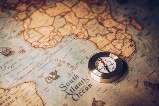 Columbus day and world map with compass