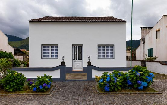 Traditional houses, Sete Cidades, Sao Miguel Island, Azores. Beautiful view of Sete Cidades village in Sao Miguel Island, Azores, Portugal. 