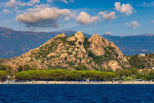 Blue sea and the characteristic caves of Cala Luna, a beach in the Golfo di Orosei, Sardinia, Italy. Big sea caves in the mediterranean coast. Sardinia, Italy.