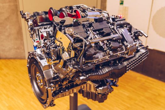 Powerful engine of a car. Internal design of engine. Car engine part. Modern powerful car engine. Concept of modern car engine isolated.