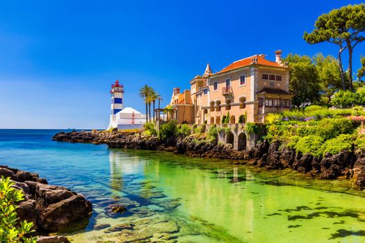 Santa Marta lighthouse and Municipal museum, Cascais, Lisbon, Portugal. Lighthouse Museum of Santa Marta in Cascais Portugal, as seen from Santa Marta Beach on a beautiful day. Cascais, Portugal.