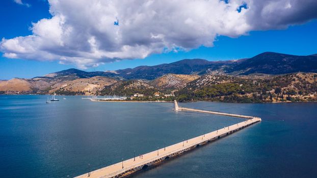 Aerial view of the De Bosset Bridge in Argostoli city on Kefalonia island. De Bosset Bridge on lakeside In Argostoli, Kefalonia. Obelisk and the de Bosset bridge in Argostoli, Kefalonia, Greece