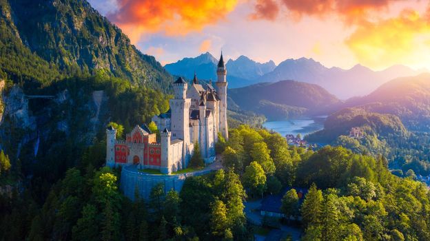 Beautiful view of world-famous Neuschwanstein Castle, the nineteenth-century Romanesque Revival palace built for King Ludwig II on a rugged cliff near Fussen, southwest Bavaria, Germany. 