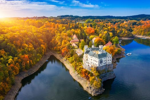 Aerial view chateau Orlik, above Orlik reservoir in beautiful autumn nature. Romantic royal Schwarzenberg castle above water level. Czechia. Orlik castle across the River Vltava, Czech Republic.