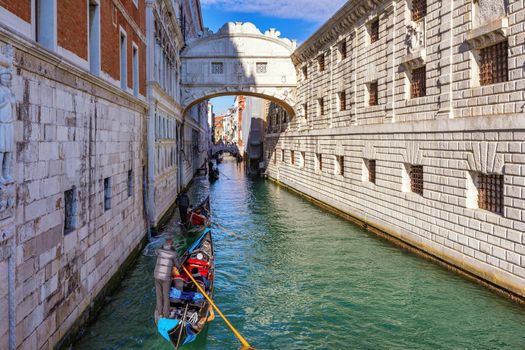 View of the Bridge of Sighs (Ponte dei Sospiri) and the Rio de Palazzo o de Canonica Canal from the Riva degli Schiavoni in Venice, Italy. The Ponte de la Canonica is visible in background.