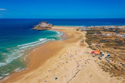Campismo beach and Dunas beach and Island Baleal near Peniche on the shore of the Atlantic ocean in west coast of Portugal. Beautiful Baleal beach at Baleal peninsula close to Peniche, Portugal.