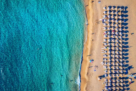 Aerial shot of beautiful turquoise beach Falasarna (Falassarna) in Crete, Greece. View of famous paradise sandy deep turquoise beach of Falasarna (Falassarna) in North West, Crete island, Greece.