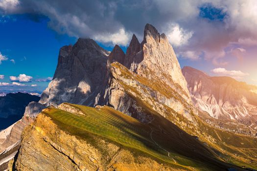View on Seceda peak. Trentino Alto Adige, Dolomites Alps, South Tyrol, Italy. Odle mountain range, Val Gardena. Majestic Furchetta peak. Odles group seen from Seceda, Santa Cristina Val Gardena.