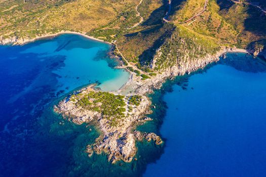 Cost of Sardinia: Peninsula of Punta Molentis. View of beautiful beach at Punta Molentis, Villasimius, Sardinia, Italy. Beautiful bay with sandy beach at Punta Molentis, Sardinia island, Italy.