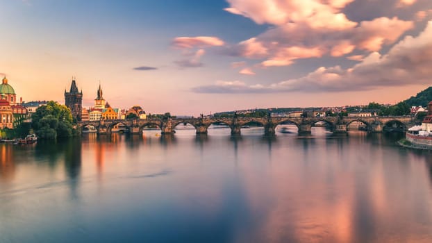 Famous iconic image of Charles bridge, Prague, Czech Republic. Concept of world travel, sightseeing and tourism.