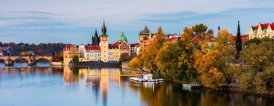 Charles Bridge in Prague in Czechia. Prague, Czech Republic. Charles Bridge (Karluv Most) and Old Town Tower. Vltava River and Charles Bridge. Concept of world travel, sightseeing and tourism.