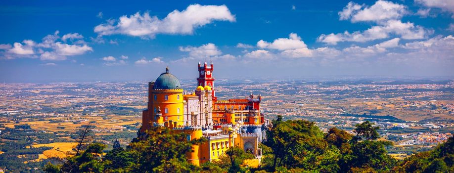 Palace of Pena in Sintra. Lisbon, Portugal. Travel Europe, holidays in Portugal. Panoramic View Of Pena Palace, Sintra, Portugal. Pena National Palace, Sintra, Portugal. 