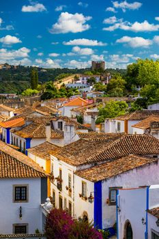 Obidos, Portugal stonewalled city with medieval fortress, historic walled town of Obidos, near Lisbon, Portugal. Beautiful view of Obidos Medieval Town, Portugal. 