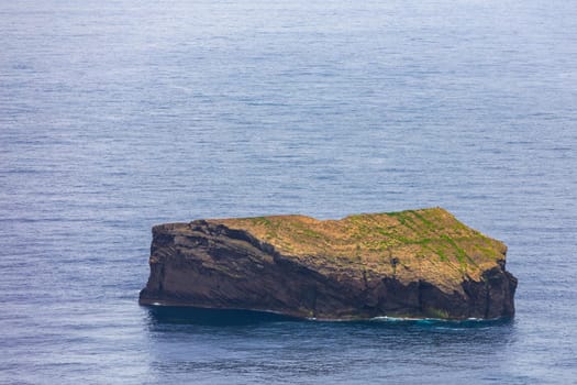 Azores panoramic view of natural landscape, wonderful scenic island of Portugal. Beautiful lagoons in volcanic craters and green fields. Tourist attraction and travel destination. Azores, Portugal.