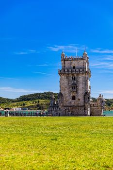 View at the Belem tower at the bank of Tejo River in Lisbon, Portugal. The Belem Tower (Torre de Belem), Lisbon, Portugal. At the margins of the Tejo river, it is an iconic site of the city. 