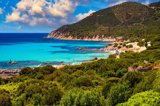 The beautiful turquoise water and white sand of Piscadeddus Beach, near Villasimius, Sardinia. The beautiful turquoise water and white sand of Piscadeddus Beach, near Villasimius, Sardinia.