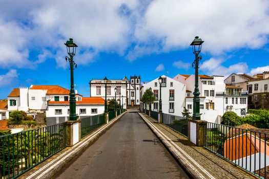 View of Nordeste on Sao Miguel Island, Azores. Old stone arch bridge in Nordeste village, Sao Miguel, Azores. Nordeste village with white town buildings on the island of Sao Miguel, Azores, Portugal.