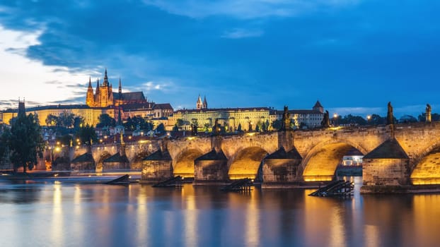 Famous iconic image of Prague castle and Charles Bridge, Prague, Czech Republic. Concept of world travel, sightseeing and tourism.