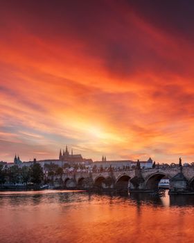 Charles Bridge at sunset with colorful sky, Prague, Czech Republic. Prague old town and iconic Charles bridge and Castle, Czech Republic. Charles Bridge (Karluv Most), Old Town Tower and Castle.