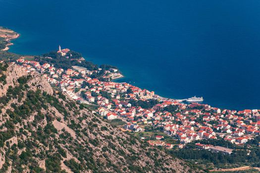 Bol on Brac island panoramic aerial view, Dalmatia, Croatia. Town of Bol from Vidova Gora aerial view, Island of Brac, Dalmatia, Croatia.