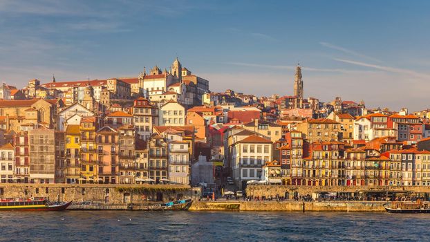 Ancient city of Porto with old multi-colored houses with red roof tiles. Portugal, Porto