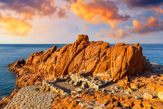 Red Rocks (called "Rocce Rosse") of Arbatax, Sardinia, Italy. Arbatax with the known red porphyry rocks nearby the port at the Capo Bellavista, Sardinia, Italy