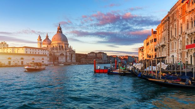 Santa Maria della Salute at Sunrise in Venice, Italy. Canal Grande sunrise of Accademia's bridge. Venice, Italy. Venetian background.