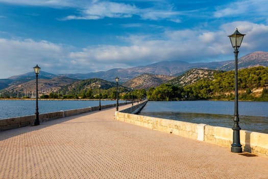 View of the De Bosset Bridge in Argostoli city on Kefalonia island. De Bosset Bridge on lakeside In Argostoli, Kefalonia. Obelisk and the de Bosset bridge in Argostoli, Kefalonia, Greece