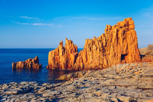 Red Rocks (called "Rocce Rosse") of Arbatax, Sardinia, Italy. Arbatax with the known red porphyry rocks nearby the port at the Capo Bellavista, Sardinia, Italy