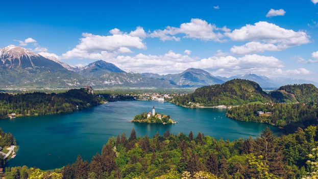 Lake Bled Slovenia. Beautiful mountain lake with small Pilgrimage Church. Most famous Slovenian lake and island Bled with Pilgrimage Church of the Assumption of Maria. Bled, Slovenia, Europe. 