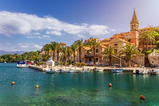 Fishing boats in Splitska village with beautiful port, Brac island, Croatia. Village of Splitska on Brac island seafront view, Dalmatia, Croatia, Croatia.
