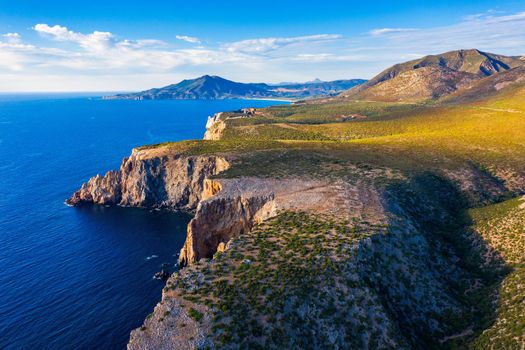Island of Sardinia, western Mediterranean rugged coast, Italy. Mediterranean island of Sardinia (Sardegna), Italy. Cliffs at the western shore, Sardinia, Italy.