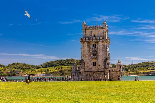 View at the Belem tower at the bank of Tejo River in Lisbon, Portugal. The Belem Tower (Torre de Belem), Lisbon, Portugal. At the margins of the Tejo river, it is an iconic site of the city. 