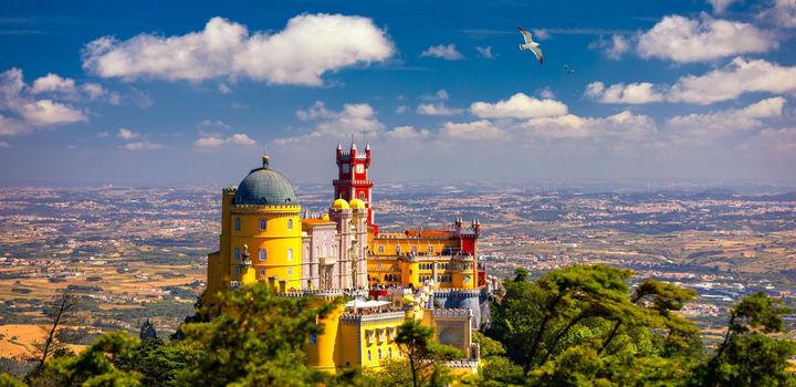 Palace of Pena in Sintra. Lisbon, Portugal. Travel Europe, holidays in Portugal. Panoramic View Of Pena Palace, Sintra, Portugal. Pena National Palace, Sintra, Portugal. 