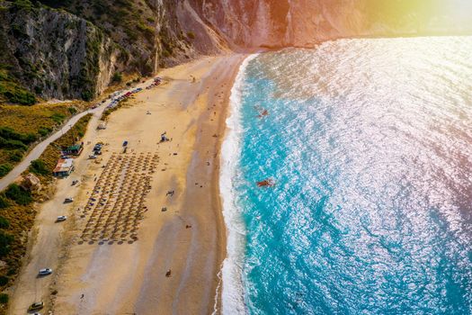 Aerial drone view of iconic turquoise and sapphire bay and beach of Myrtos, Kefalonia (Cephalonia) island, Ionian, Greece. Myrtos beach, Kefalonia island, Greece. Beautiful view of Myrtos beach.