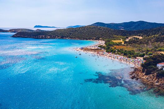 Aerial shot of Tuerredda beach on a beautiful day, Sardinia, Italy. Aerial drone view of Tuerredda in Sardegna. Famous Tuerredda beach on the south of Sardinia near Teulada. Sardinia, Italy.