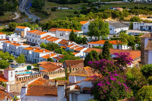 Obidos, Portugal stonewalled city with medieval fortress, historic walled town of Obidos, near Lisbon, Portugal. Beautiful view of Obidos Medieval Town, Portugal. 