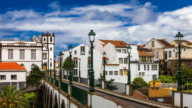 View of Nordeste on Sao Miguel Island, Azores. Old stone arch bridge in Nordeste village, Sao Miguel, Azores. Nordeste village with white town buildings on the island of Sao Miguel, Azores, Portugal.