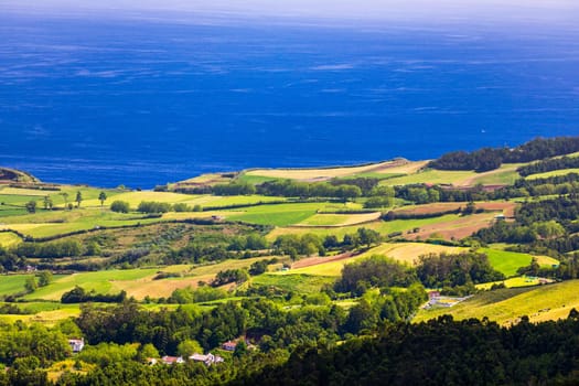 Azores panoramic view of natural landscape, wonderful scenic island of Portugal. Beautiful lagoons in volcanic craters and green fields. Tourist attraction and travel destination. Azores, Portugal.