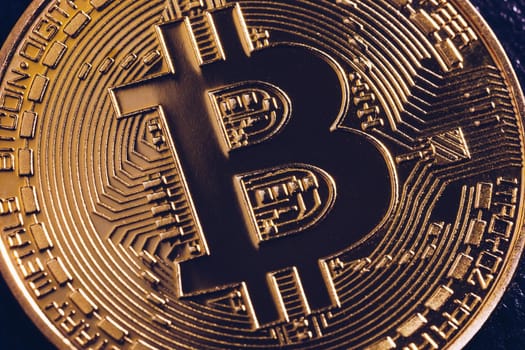 Crypto currency golden coin with bitcoin symbol on isolated on black background. Bitcoin Coin on black background. Bitcoin cryptocurrency.  Cryptocurrency Coin Concept.