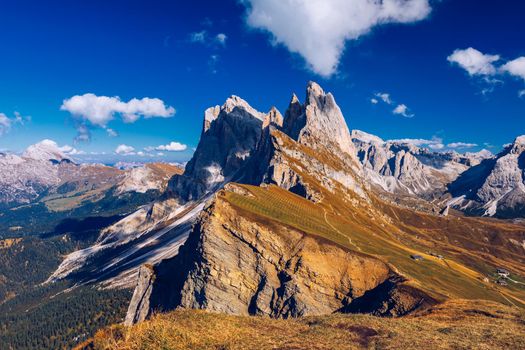 Seceda in autumn in South Tyrol in the Alps of North Italy. Views from Seceda over the Odle mountains in autumn with fall colors. Seceda, Val Gardena, Trentino Alto Adige, South Tyrol in Italy.